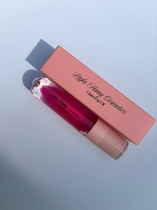 Diva Lip Oil (Glitter Pink Tint / Peach Scent)